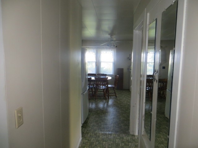 30702 North 1700th Road East Odell, IL 61313 - Photo 27 of 32 a view of a hallway with dining room and a livingroom with furniture