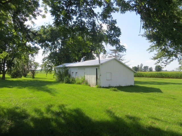 30702 North 1700th Road East Odell, IL 61313 - Photo 8 of 32 a view of a backyard with large trees