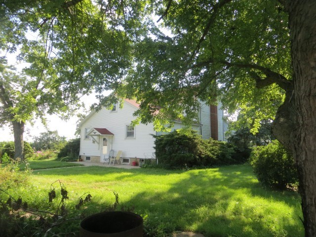30702 North 1700th Road East Odell, IL 61313 - Photo 9 of 32 a view of a garden with large tree