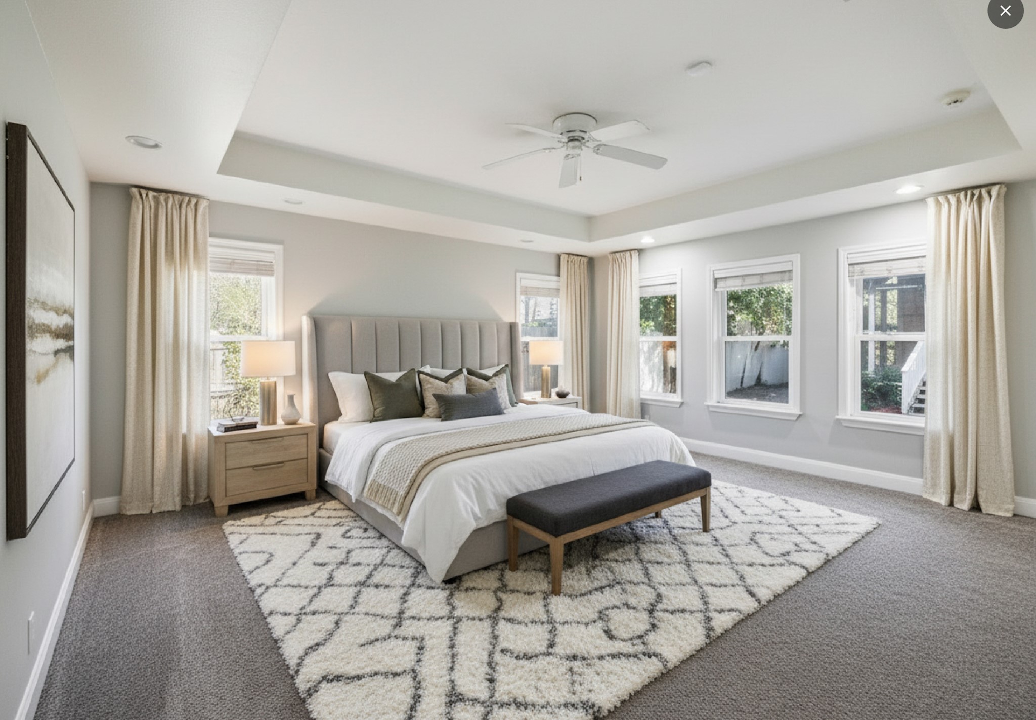 901 North Craig Street Victoria, TX 77901 - Photo 21 of 46 a spacious bedroom with a bed and glass window
