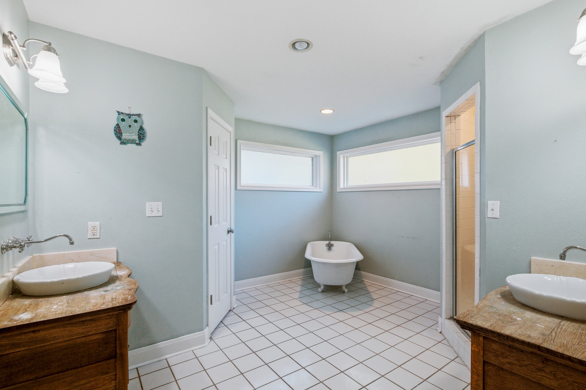 901 North Craig Street Victoria, TX 77901 - Photo 27 of 46 a bathroom with a toilet sink and mirror