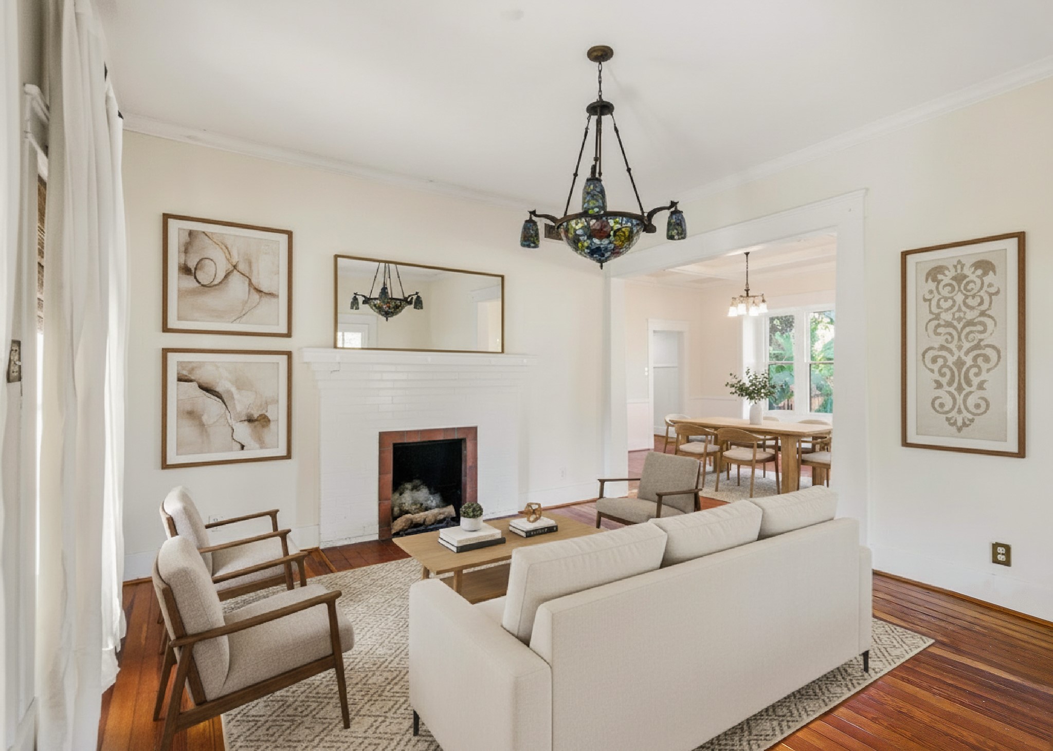 901 North Craig Street Victoria, TX 77901 - Photo 4 of 46 a living room with furniture and a chandelier