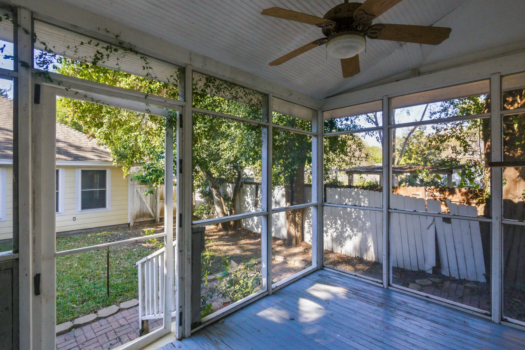 901 North Craig Street Victoria, TX 77901 - Photo 45 of 46 a view of an empty room with wooden floor and a floor to ceiling window
