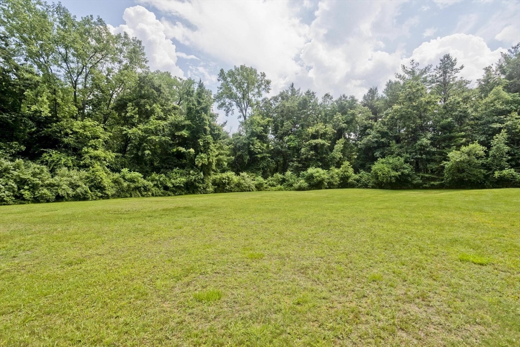 610 County Road, Unit 7 Holyoke, MA 01040 - Photo 22 of 24 a view of yard with swimming pool and green space