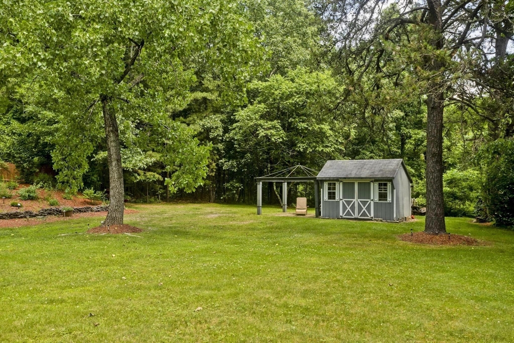 610 County Road, Unit 7 Holyoke, MA 01040 - Photo 23 of 24 a front view of a house with a yard