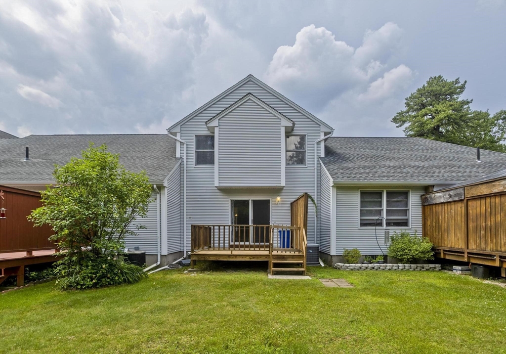 610 County Road, Unit 7 Holyoke, MA 01040 - Photo 24 of 24 a front view of a house with a garden and plants