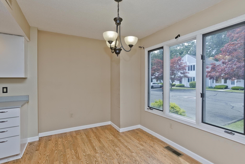 610 County Road, Unit 7 Holyoke, MA 01040 - Photo 6 of 24 a view of a bedroom with a large window