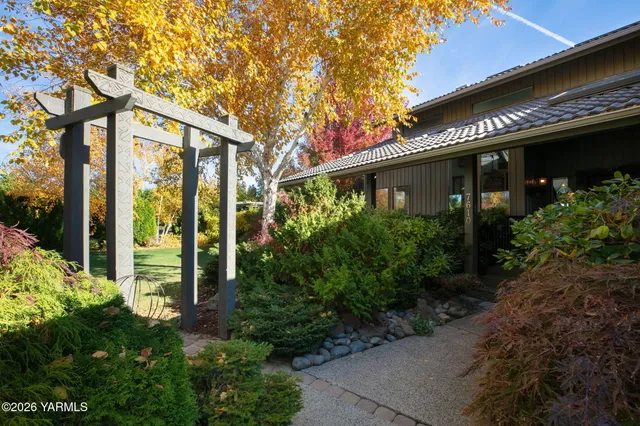 a house view with a garden space
