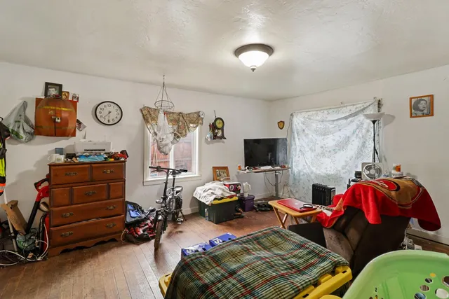 a kitchen that has a lot of cabinets a sink and a stove