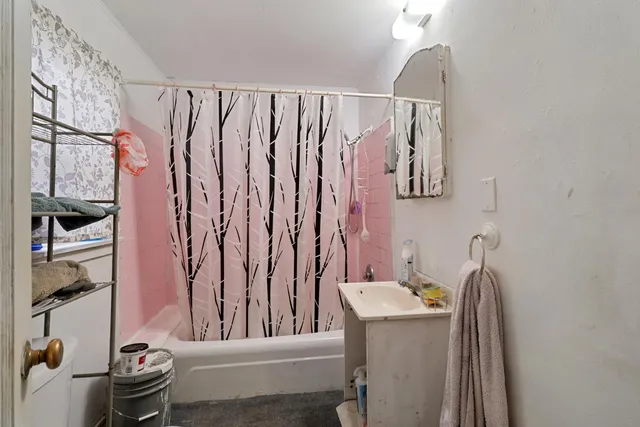 a view of a pathway with a backyard