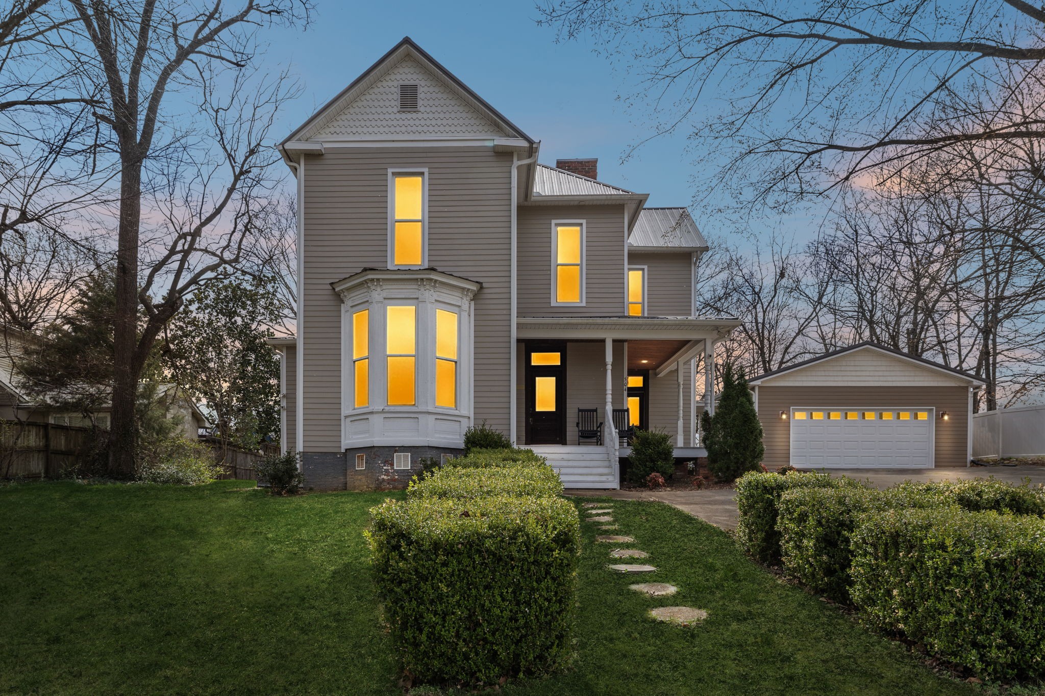 504 5th Avenue West Springfield, TN 37172 - Photo 1 of 57 a front view of a building with garden