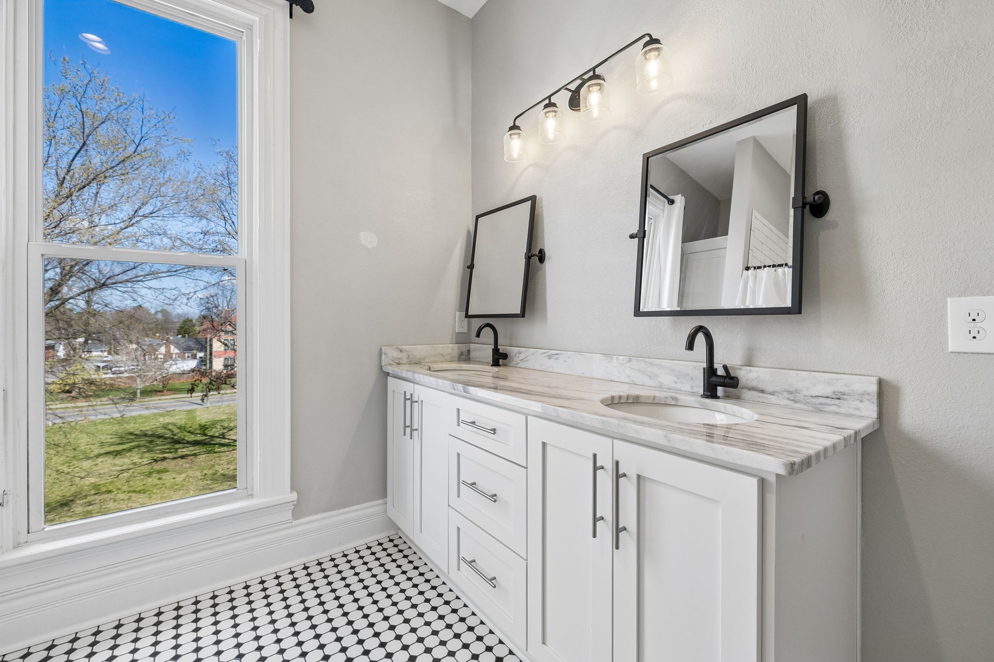504 5th Avenue West Springfield, TN 37172 - Photo 31 of 57 a bathroom with a sink vanity and a mirror
