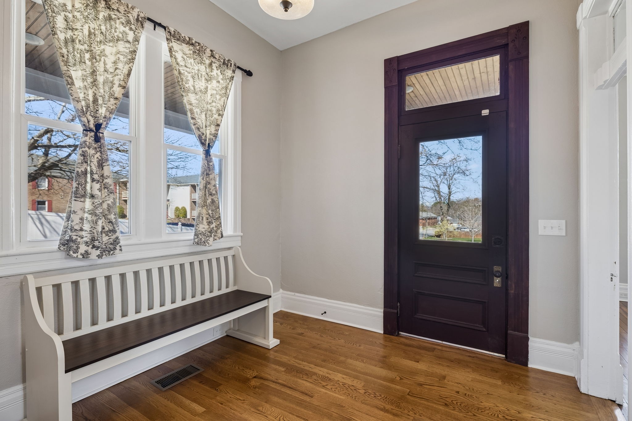 504 5th Avenue West Springfield, TN 37172 - Photo 5 of 57 a view of a hallway with wooden floor and windows