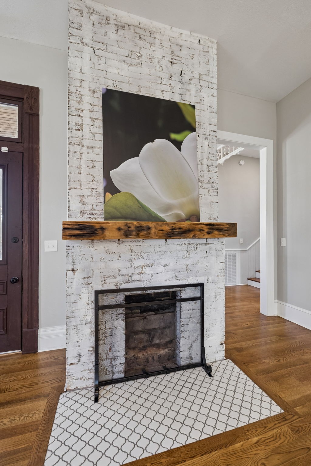 504 5th Avenue West Springfield, TN 37172 - Photo 8 of 57 a view of fireplace and entryway with wooden floor