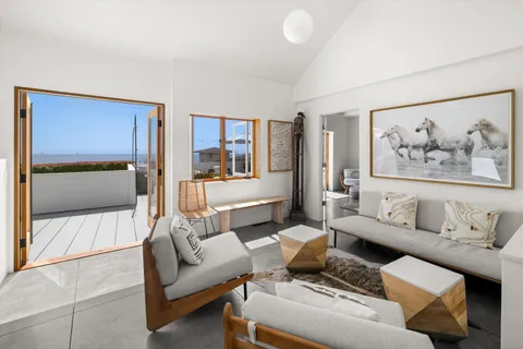 a living room with furniture and a couch