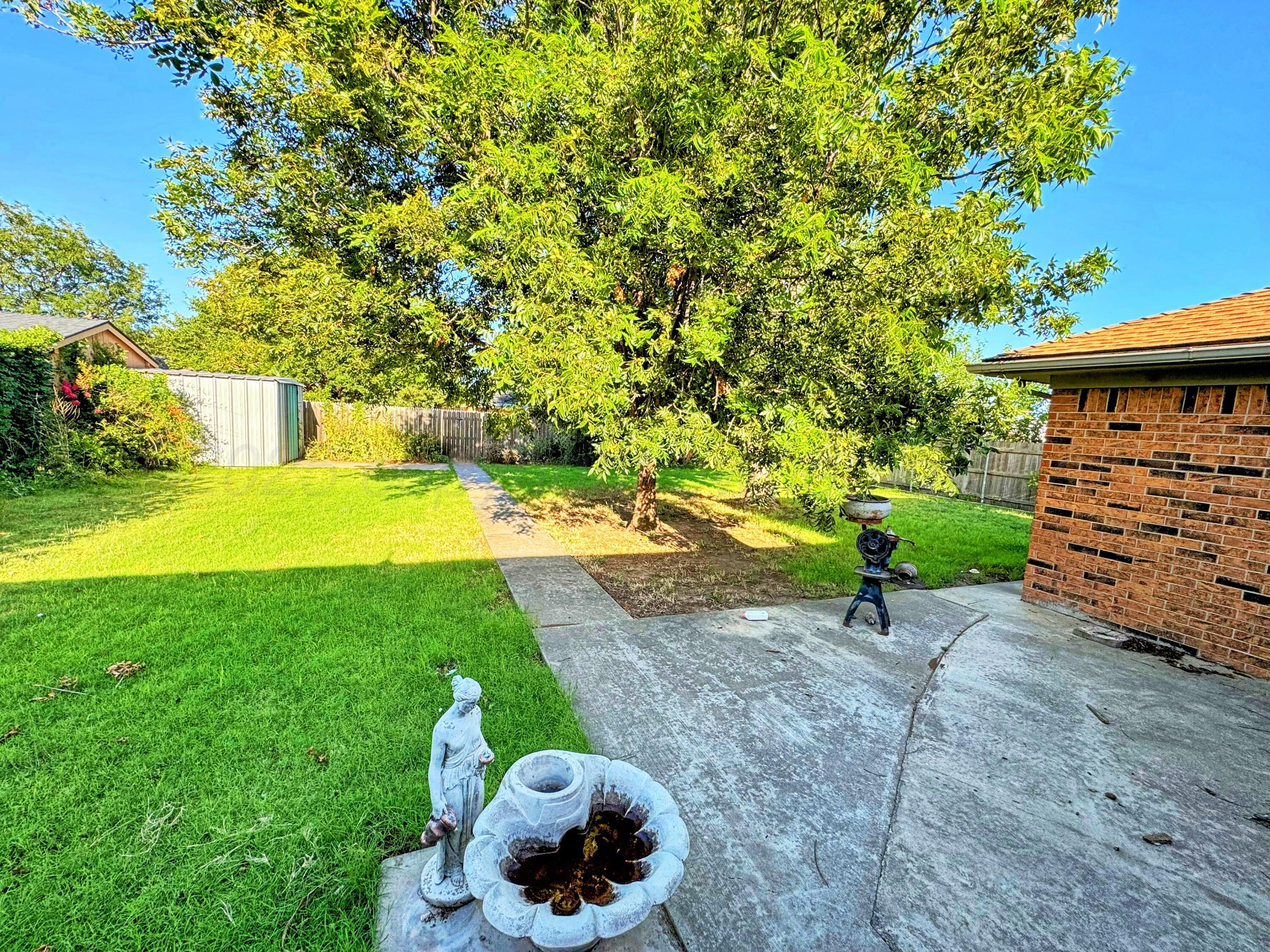 1905 Utah Street Perryton, TX 79070 - Photo 21 of 22 a view of an outdoor space and a yard