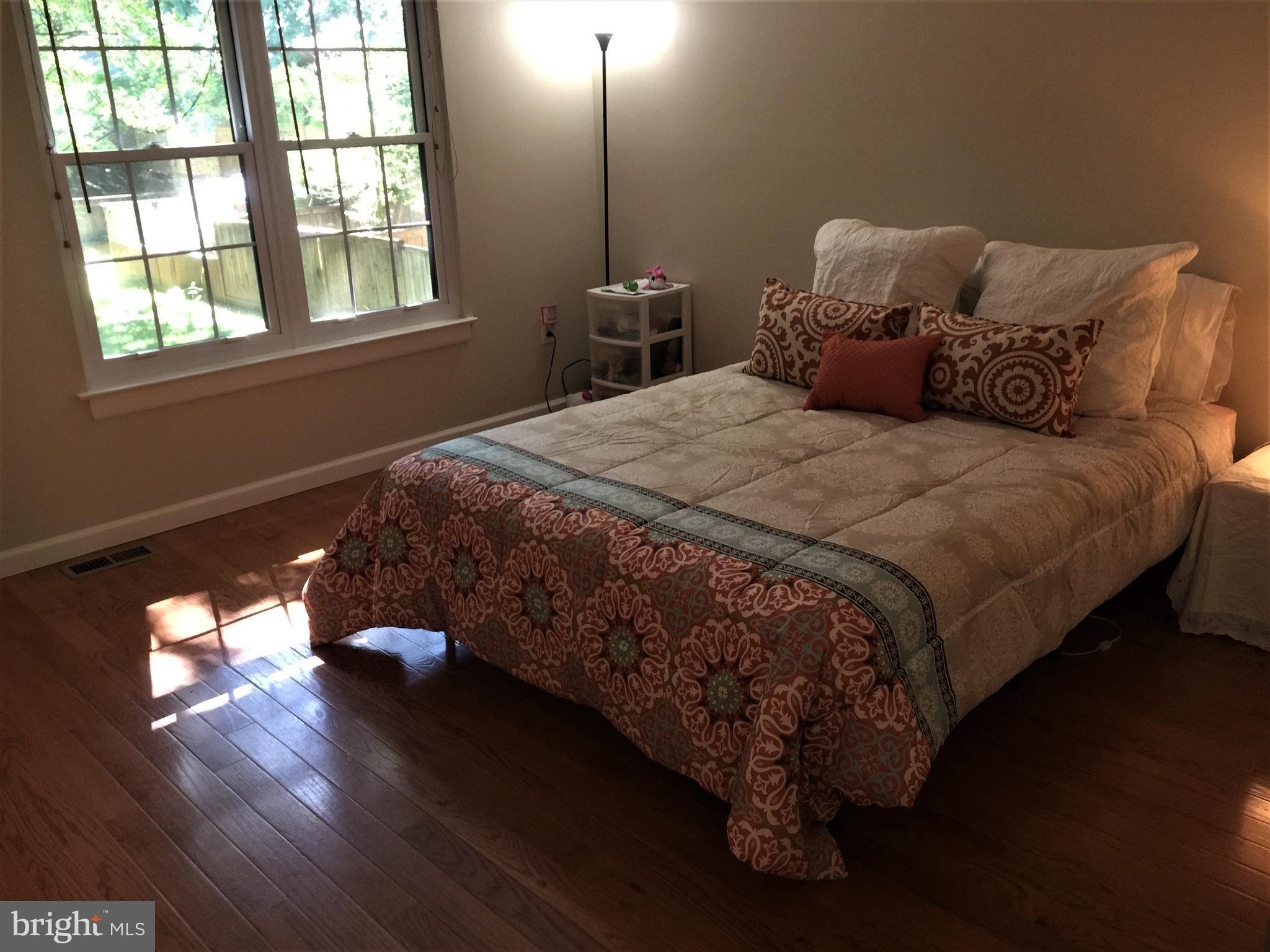 2059 Headlands Circle Reston, VA 20191 - Photo 11 of 30 Hardwood Floors, Walk in closet w/ Organizers