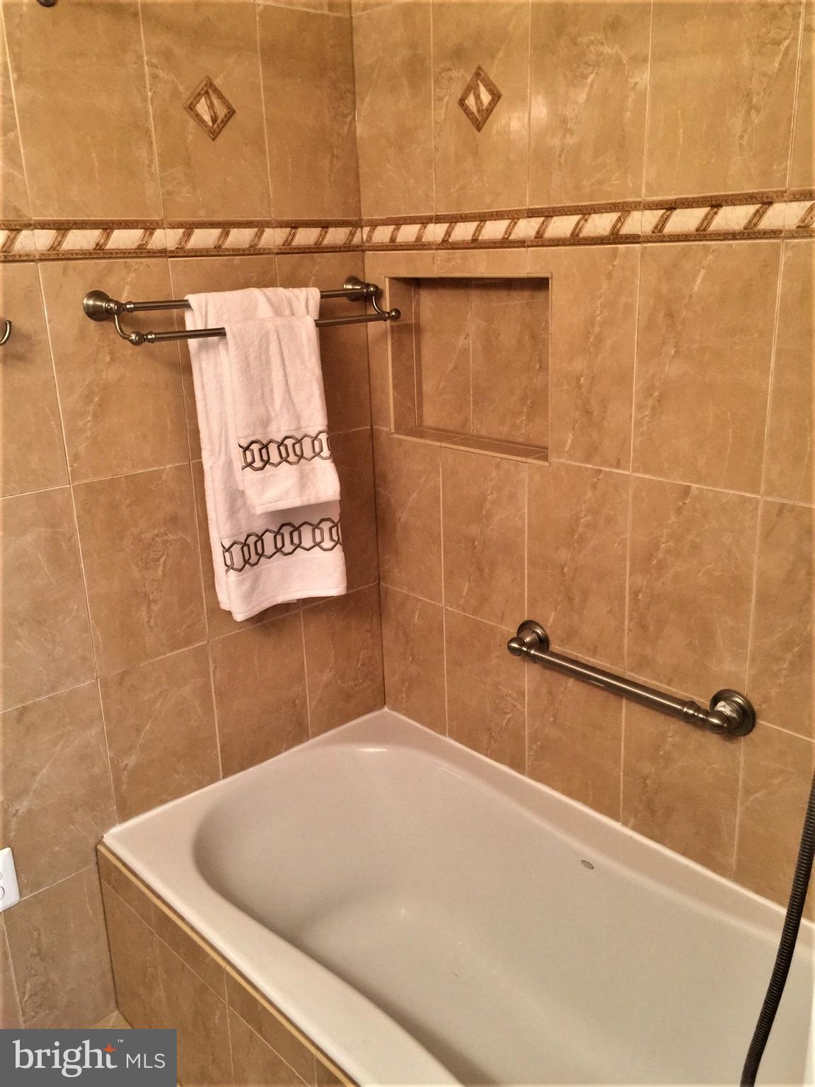 2059 Headlands Circle Reston, VA 20191 - Photo 16 of 30 Two Deep soaking tubs w/ ceramic surround/wall