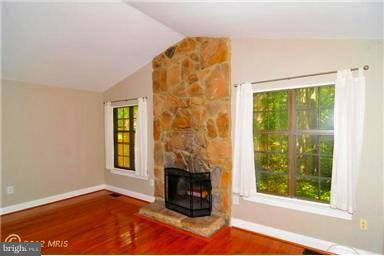 2059 Headlands Circle Reston, VA 20191 - Photo 9 of 30 Extension has vaulted ceiling and stone accentwall