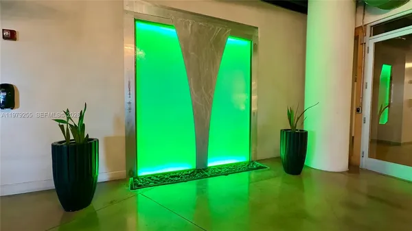 a view of a room with a plants and a potted plant