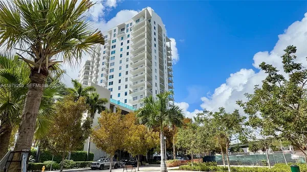 a view of a city with tall buildings