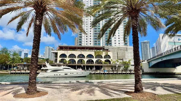 a view of a patio with a yard