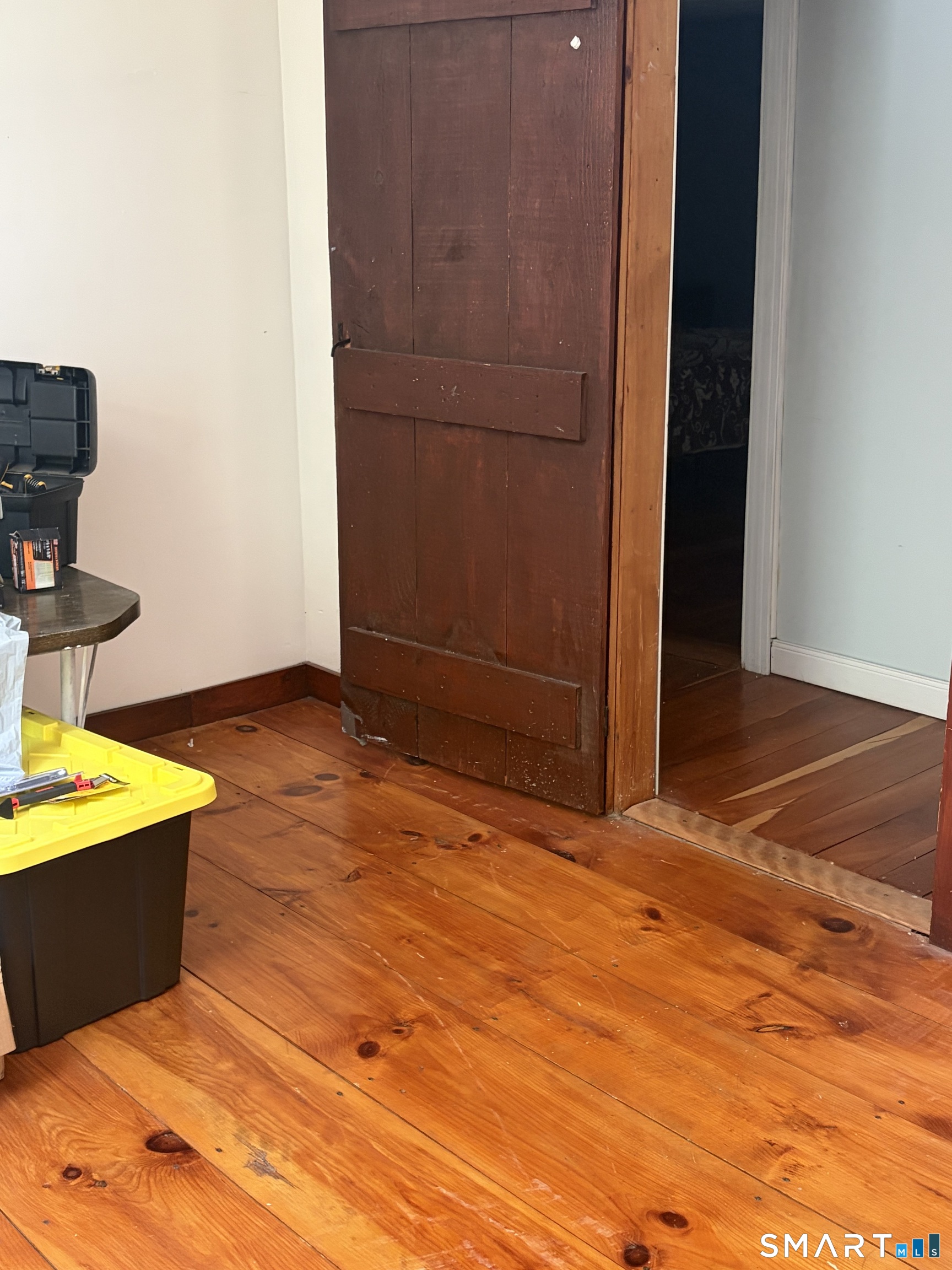 1079 Main Street Coventry, CT 06238 - Photo 14 of 19 a view of an empty room with wooden floor