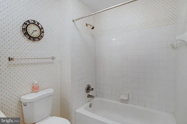 a view of balcony with wooden floor and outdoor seating