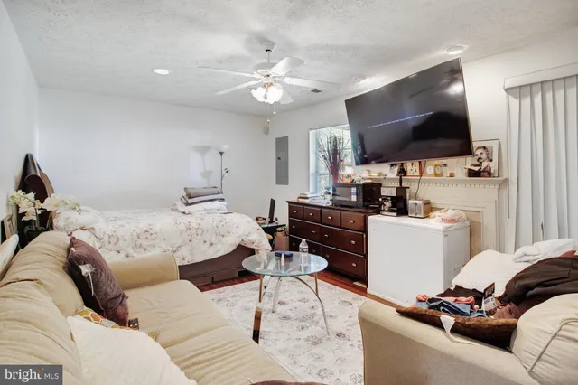 a view of a brick building next to a yard