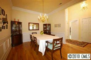 710 Beechnut Court Fort Mill, SC 29708 - Photo 5 of 8 a view of a dining room with furniture and a chandelier