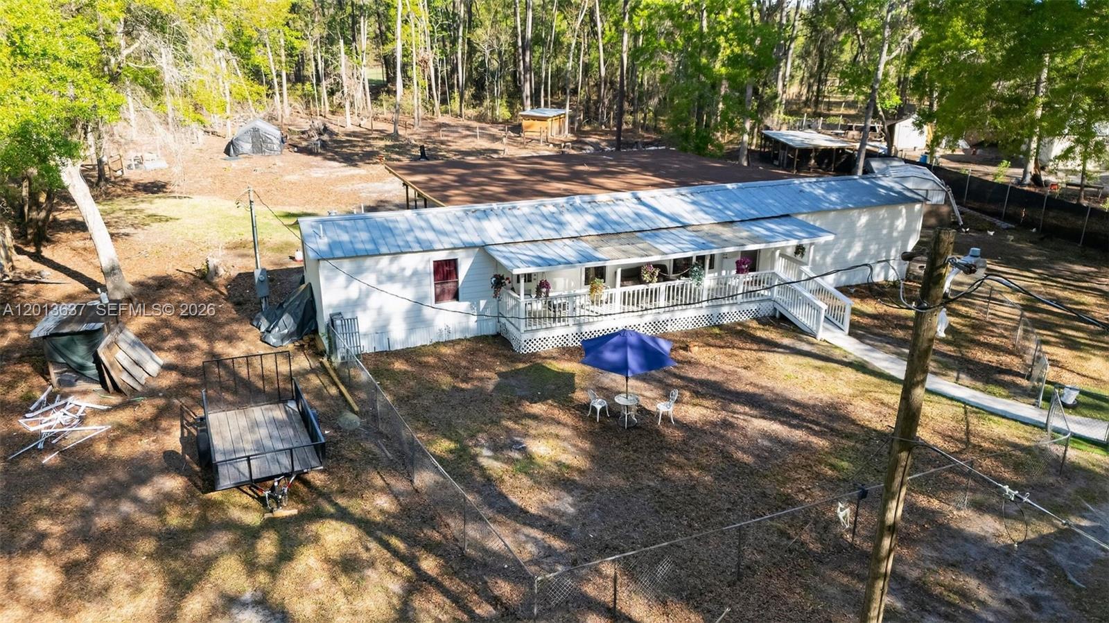 2522 Northwest 121st Avenue Gainesville, FL 32609 - Photo 12 of 40 a view of outdoor space with seating area