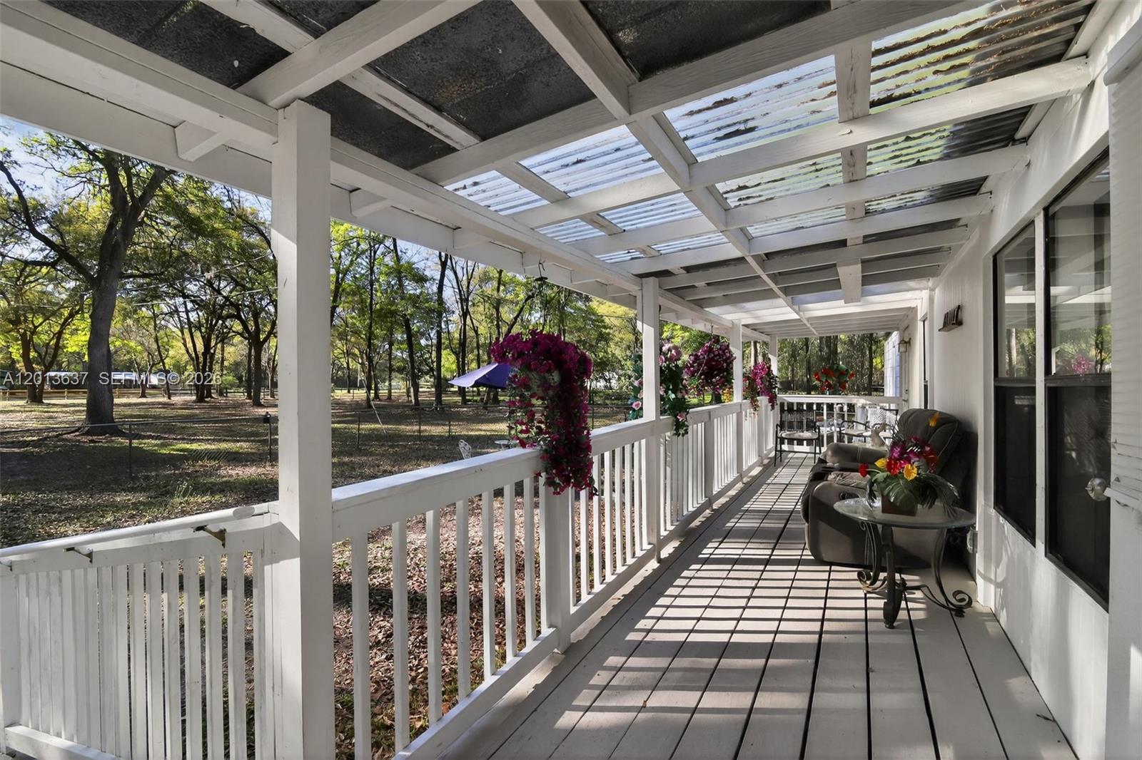 2522 Northwest 121st Avenue Gainesville, FL 32609 - Photo 18 of 40 a view of a porch