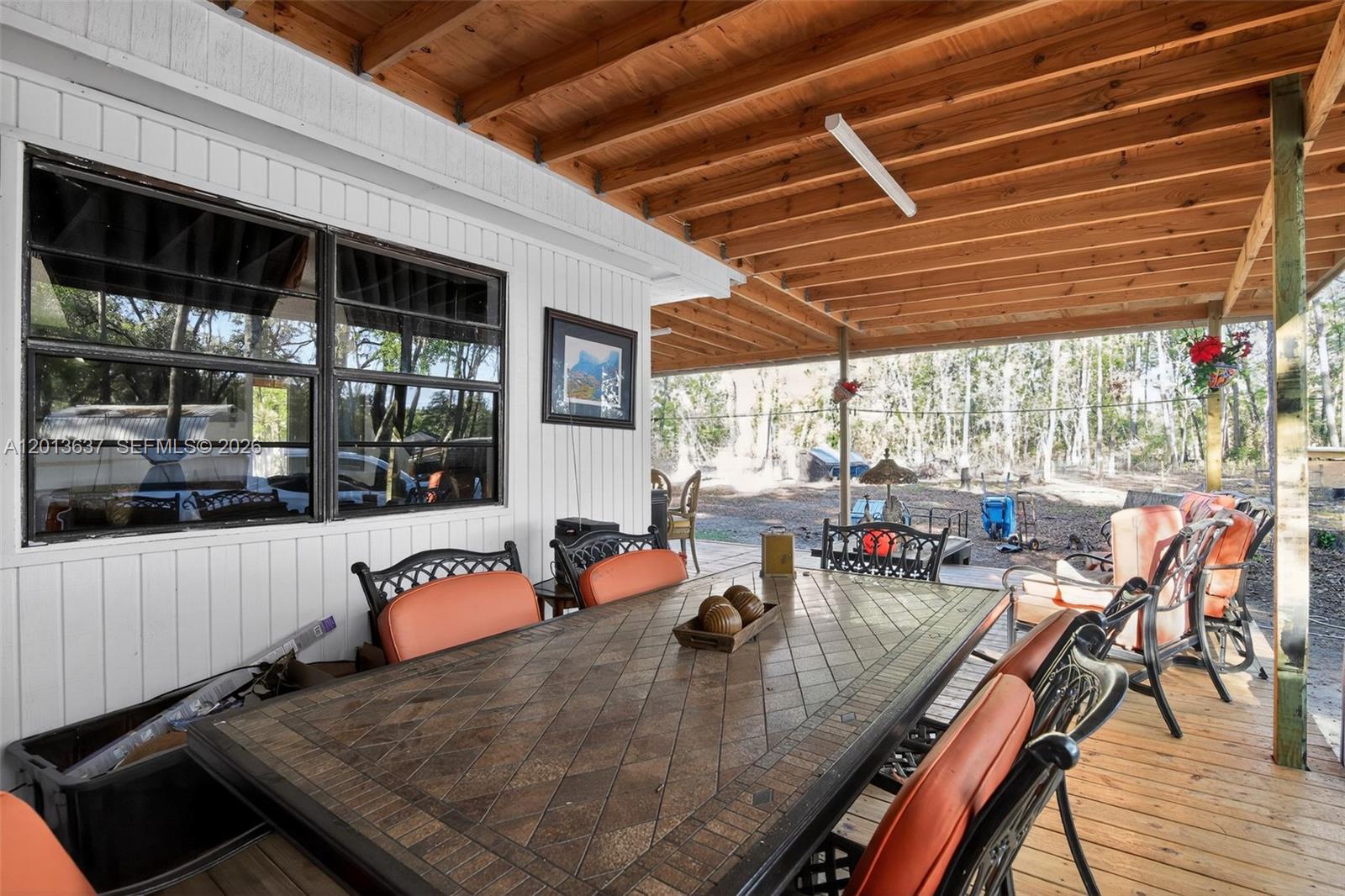 2522 Northwest 121st Avenue Gainesville, FL 32609 - Photo 21 of 40 an outdoor space with seating