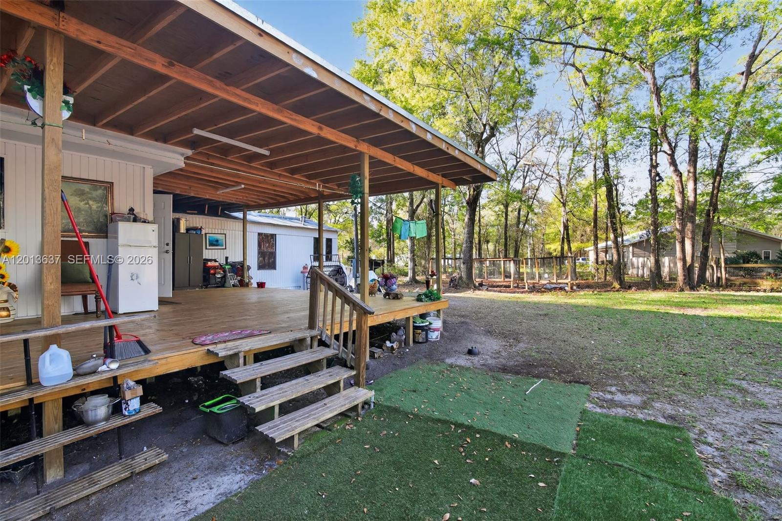 2522 Northwest 121st Avenue Gainesville, FL 32609 - Photo 23 of 40 a view of a park with chairs