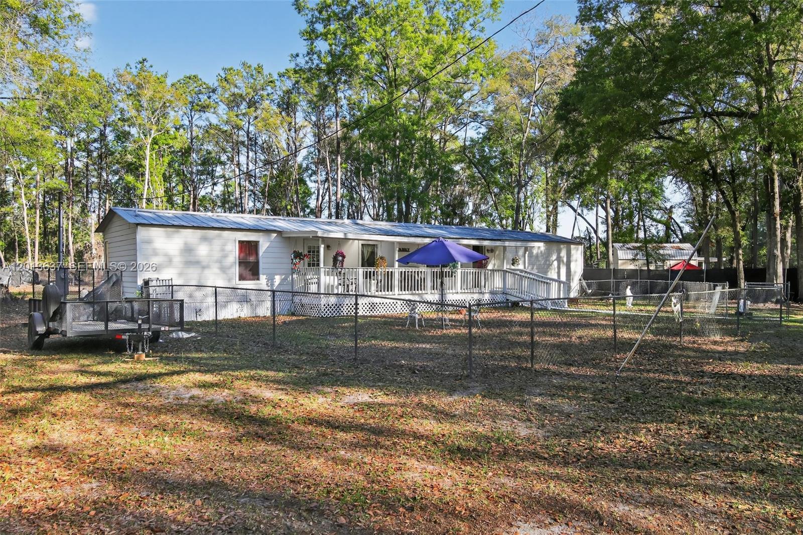 2522 Northwest 121st Avenue Gainesville, FL 32609 - Photo 24 of 40 a view of house with outdoor space