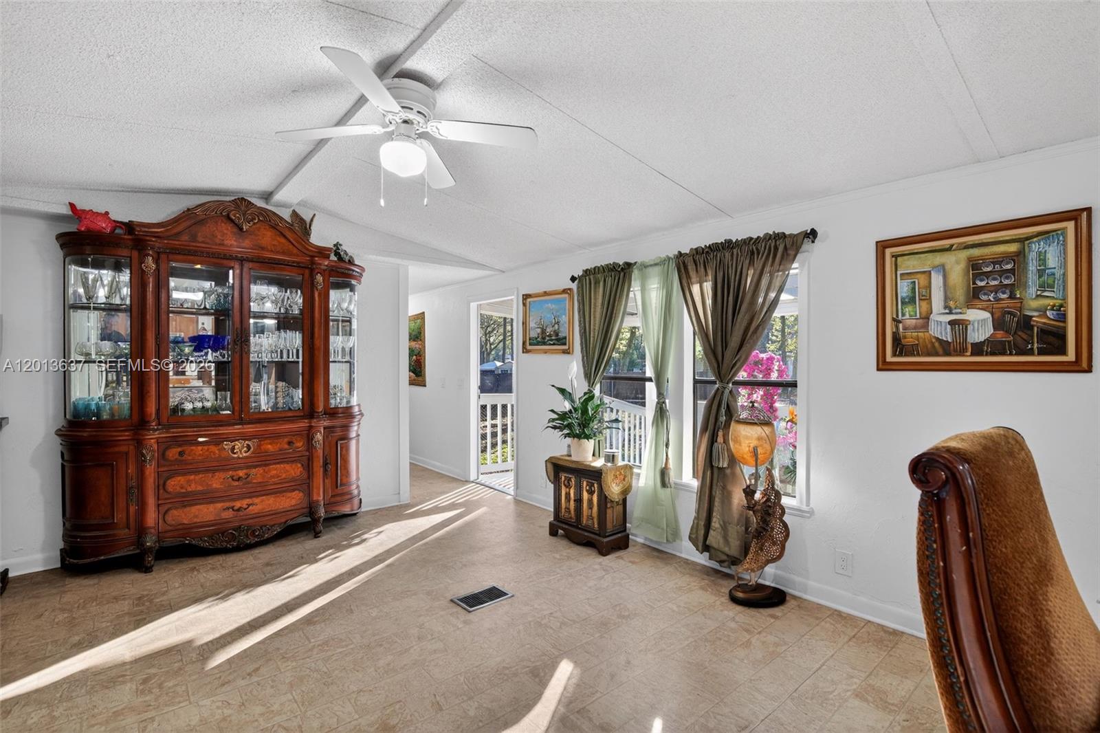 2522 Northwest 121st Avenue Gainesville, FL 32609 - Photo 27 of 40 a view of a livingroom with furniture and windows