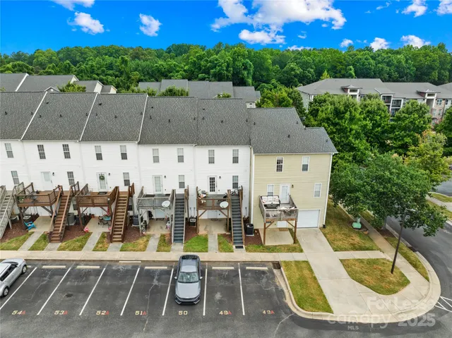 swimming pool view with a seating space