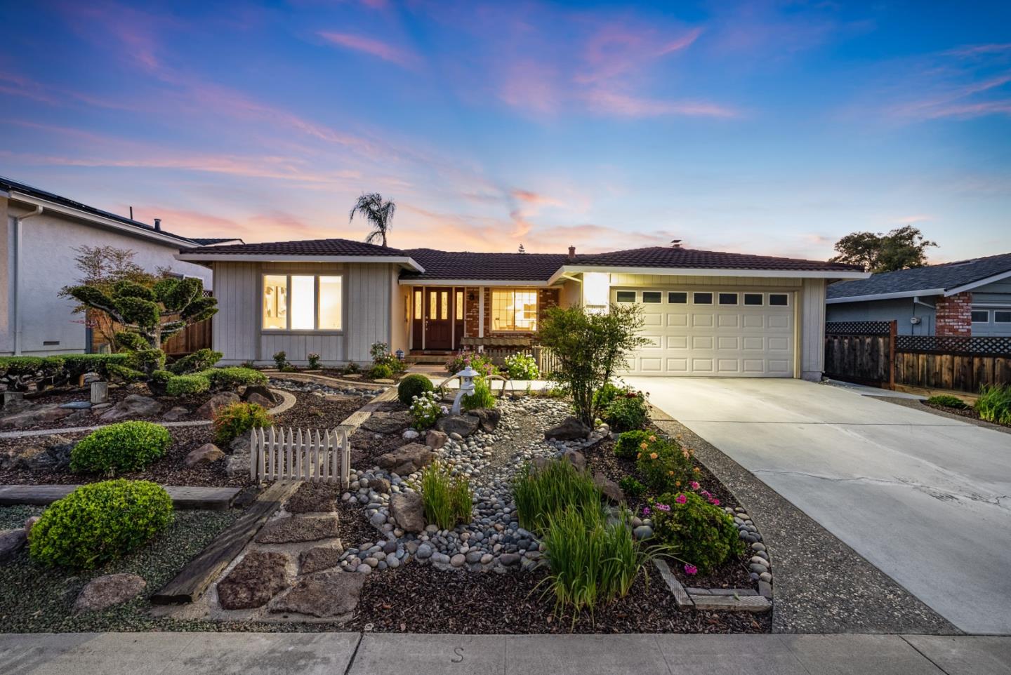 5301 Roxanne Drive San Jose, CA 95124 - Photo 1 of 1 a front view of a house with a yard