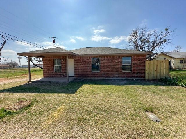 1107 North 4th Street Merkel, TX 79536 - Photo 1 of 16 a view of a house with a yard