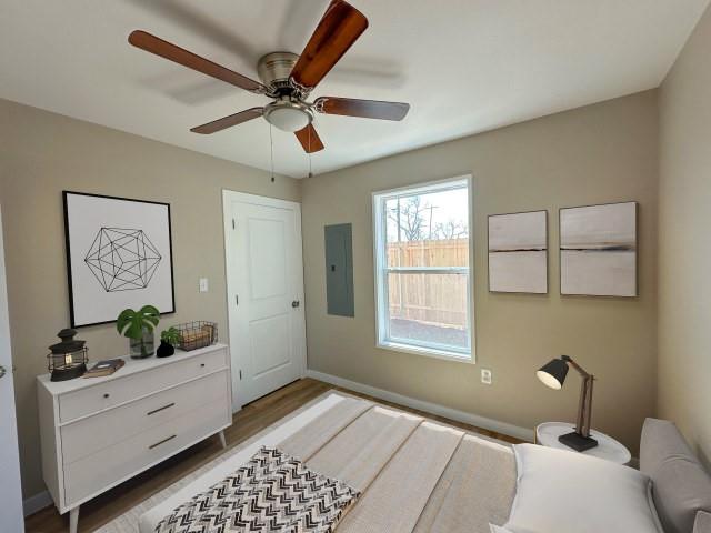 1107 North 4th Street Merkel, TX 79536 - Photo 13 of 16 a room with chandelier fan and windows
