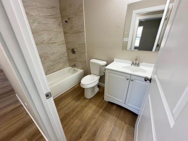 1107 North 4th Street Merkel, TX 79536 - Photo 15 of 16 a bathroom with a sink and a mirror