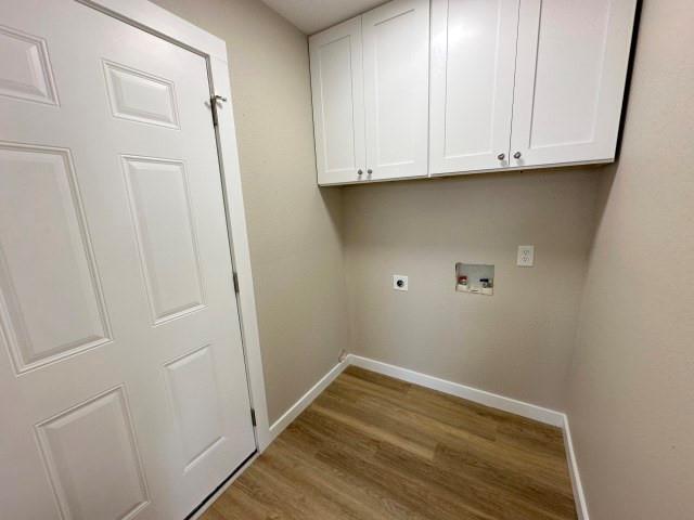 1107 North 4th Street Merkel, TX 79536 - Photo 16 of 16 a view of storage and utility room with wooden floor