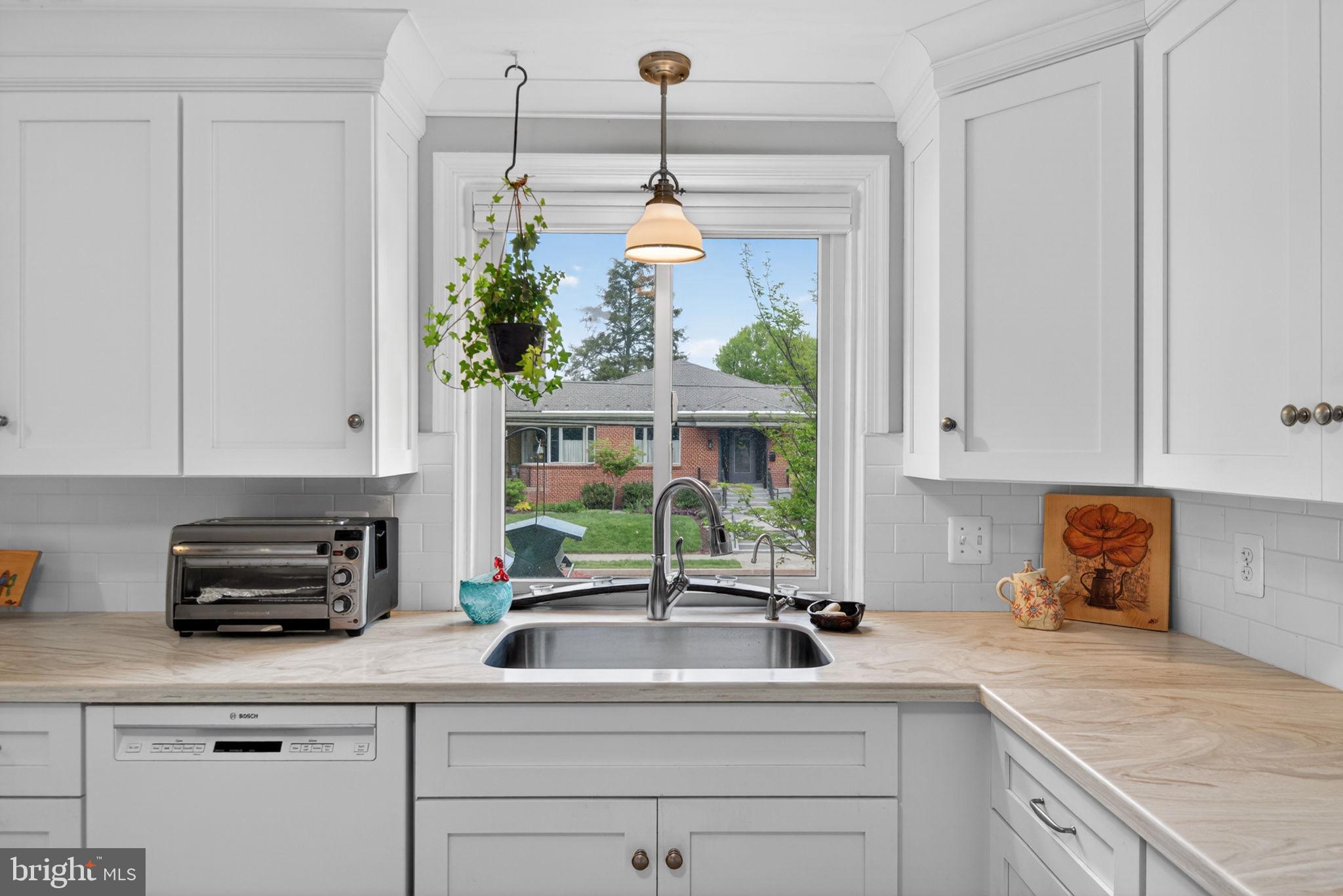 102 East Third Avenue Lititz, PA 17543 - Photo 13 of 45 a kitchen with a sink and cabinets