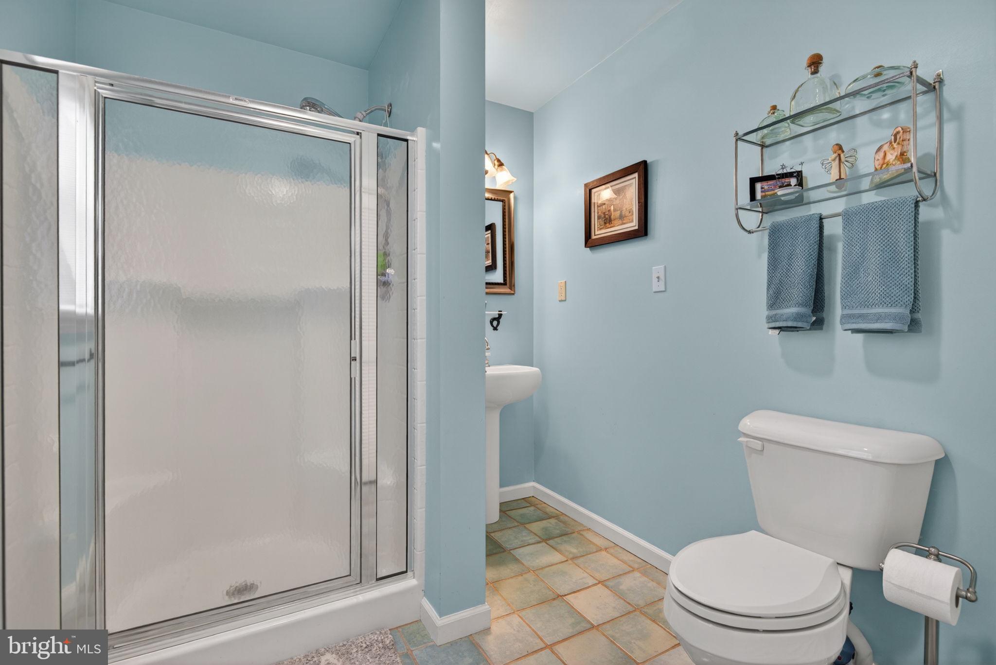102 East Third Avenue Lititz, PA 17543 - Photo 26 of 45 a white toilet sitting next to a bathroom sink