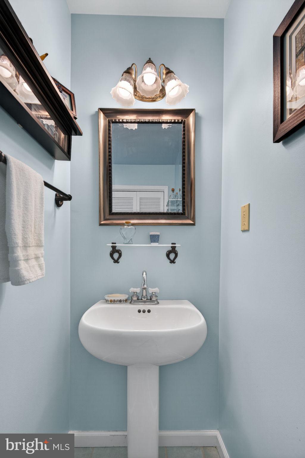 102 East Third Avenue Lititz, PA 17543 - Photo 27 of 45 a bathroom with a sink and a mirror