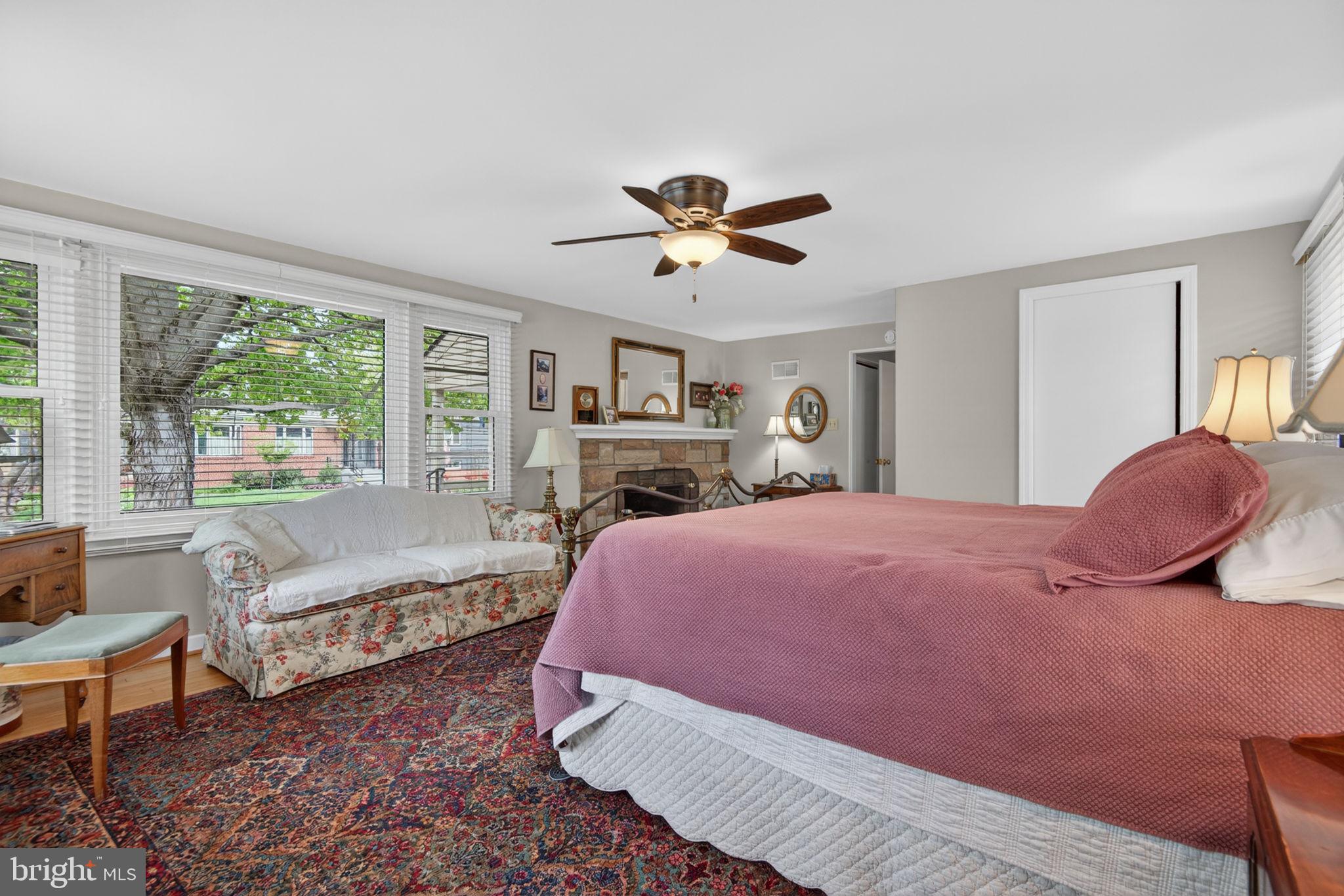 102 East Third Avenue Lititz, PA 17543 - Photo 29 of 45 a bedroom with a bed and wooden floor