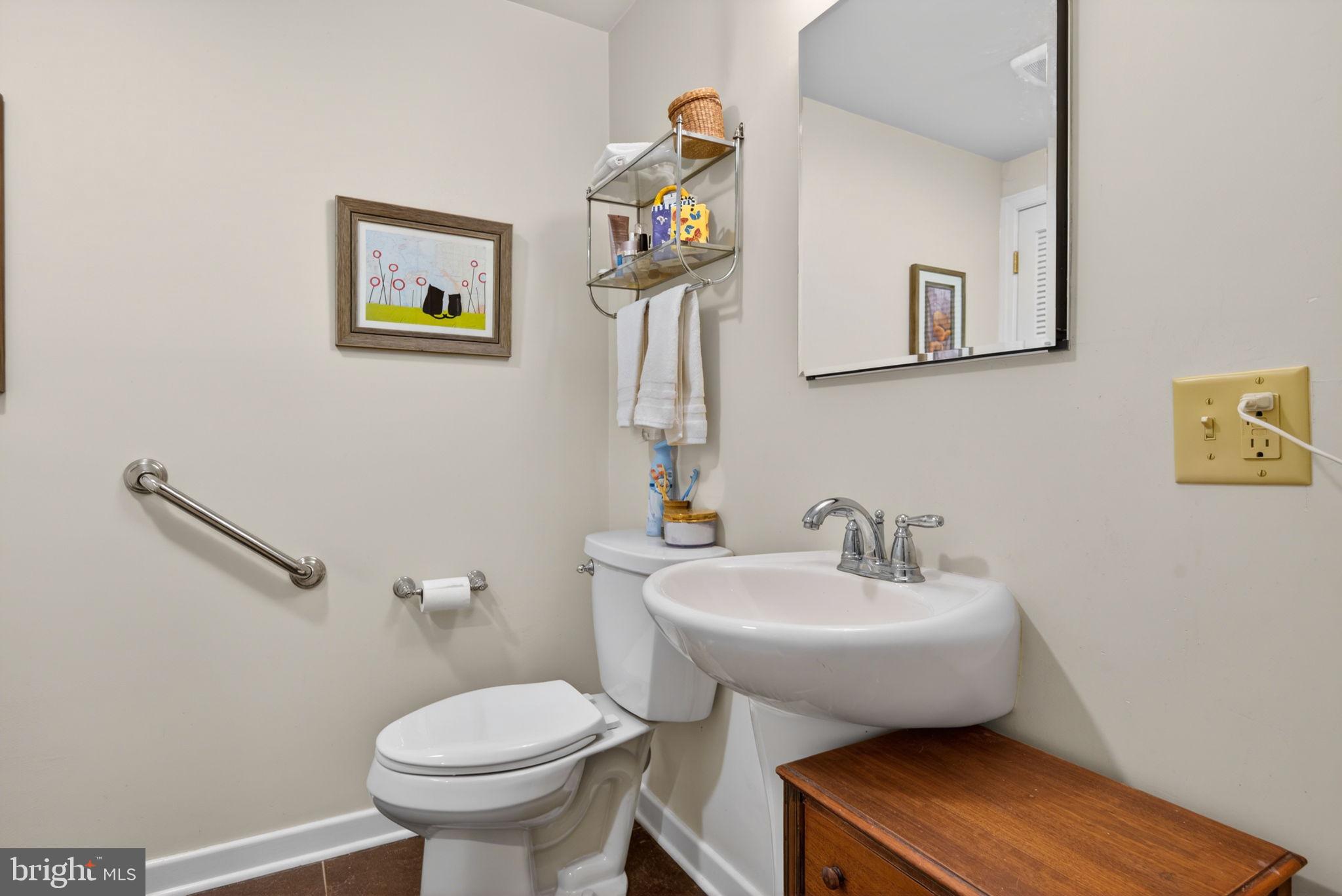 102 East Third Avenue Lititz, PA 17543 - Photo 32 of 45 a bathroom with a sink mirror and toilet