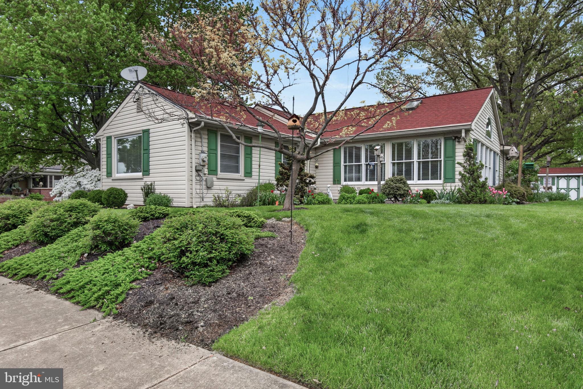 102 East Third Avenue Lititz, PA 17543 - Photo 38 of 45 a front view of a house with a garden