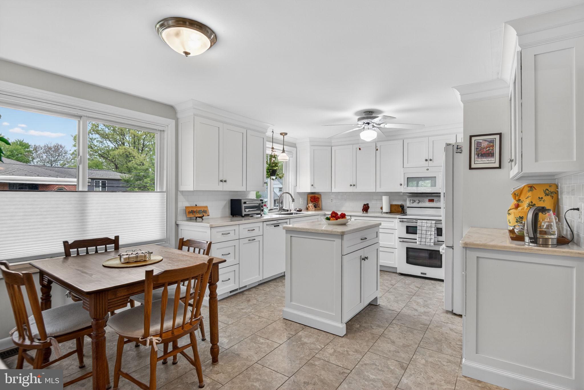 102 East Third Avenue Lititz, PA 17543 - Photo 7 of 45 a kitchen that has a lot of cabinets in it and appliances