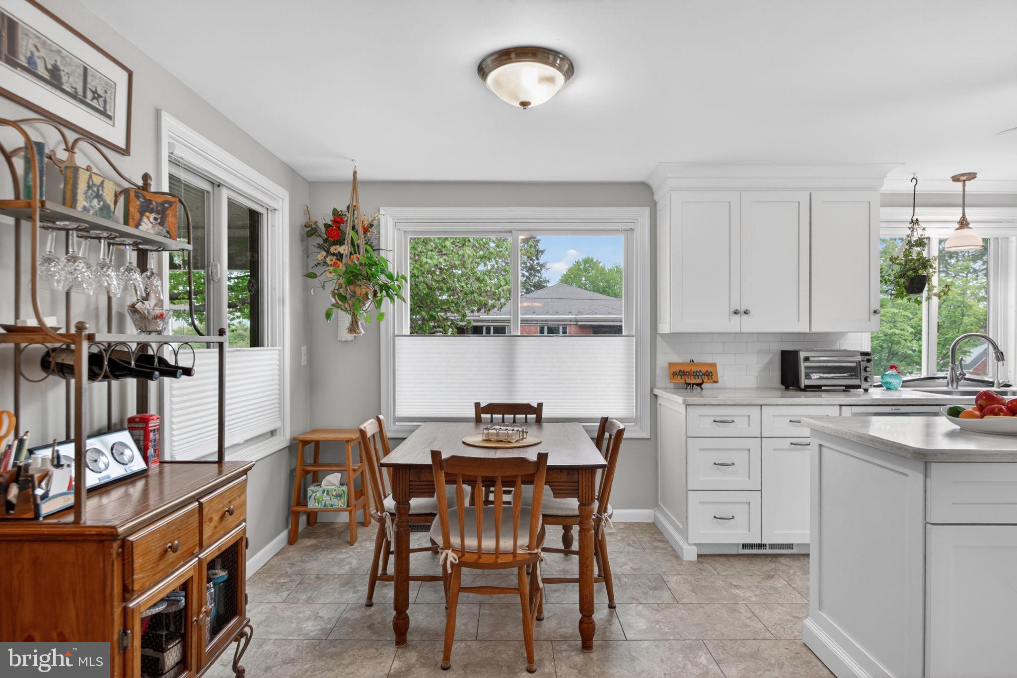 102 East Third Avenue Lititz, PA 17543 - Photo 8 of 45 a view of a dining room with furniture window and outside view